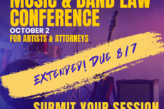 Promotional graphic for the Lawyers for the Creative Arts Music & Band Law Conference, presented in partnership with 2112 and the Center for Creative Entrepreneurship. The conference will take place October 2 and is intended for artists and attorneys. The graphic features a purple-lit stage with a drum kit, an electric bass guitar on a stand, and a guitar amplifier, evoking a live music venue. Large yellow text announces the conference title. On the right, a bold call to action reads: “Submit Your Session Proposal Today!” with proposals due by August 7.